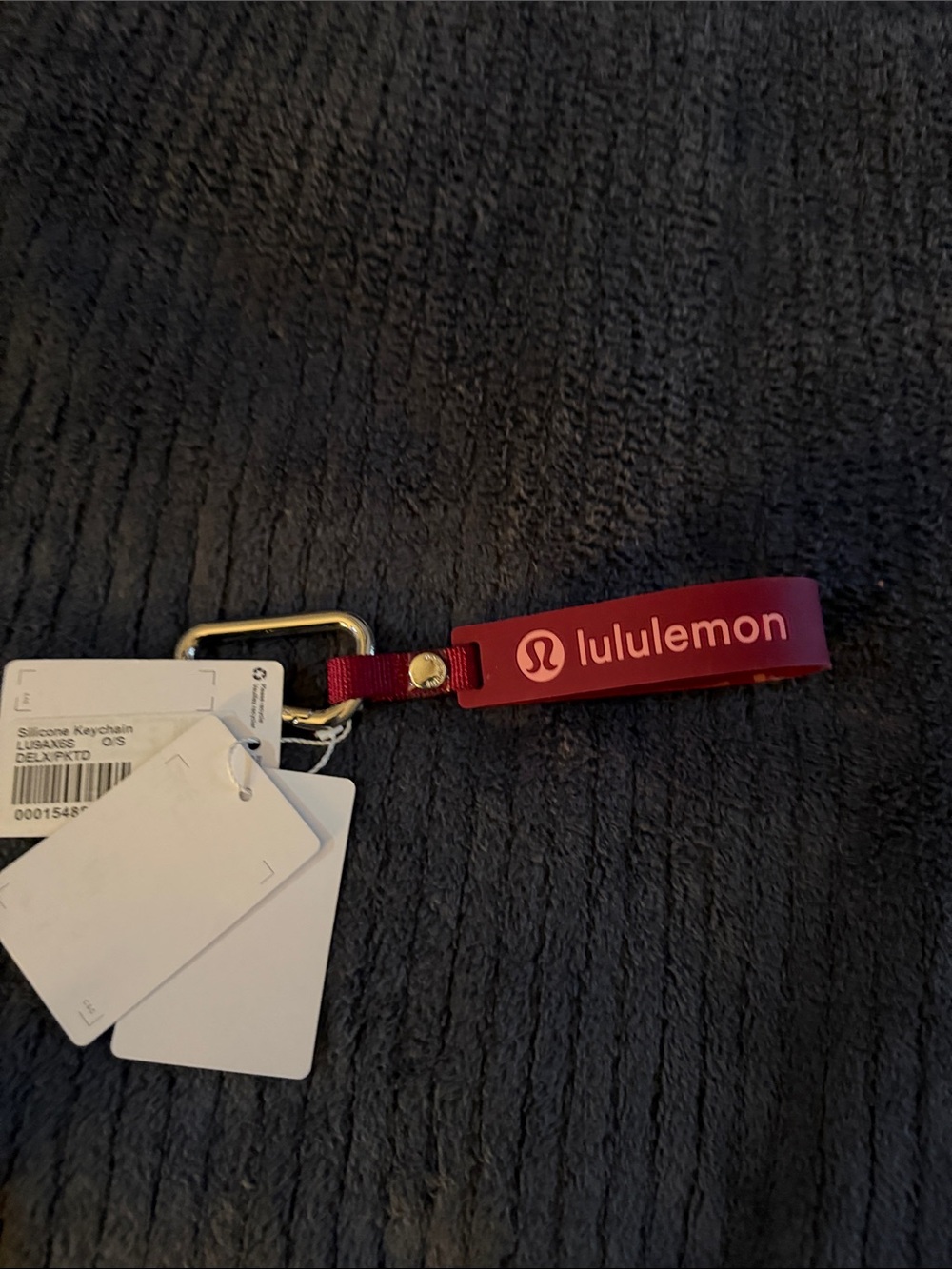 lululemon burgundy/baby pink  silicone keychain with logo